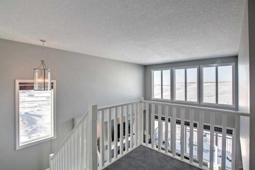 22 Evansborough View Nw, Calgary, AB - Indoor Photo Showing Other Room