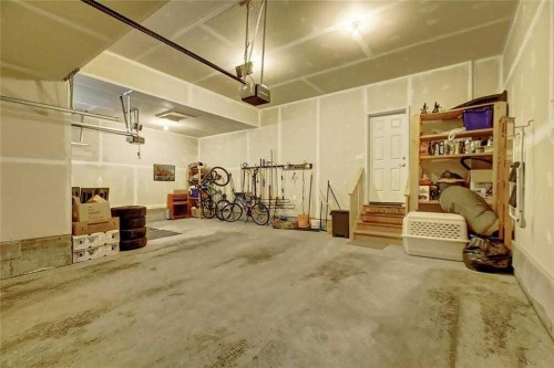 22 Evansborough View Nw, Calgary, AB - Indoor Photo Showing Garage