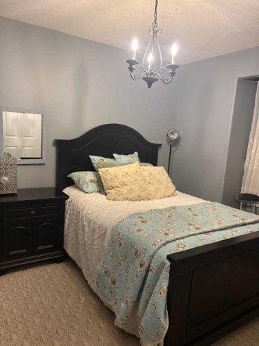 917 6 Avenue, Wainwright, AB - Indoor Photo Showing Bedroom