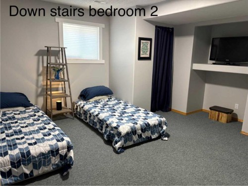 917 6 Avenue, Wainwright, AB - Indoor Photo Showing Bedroom