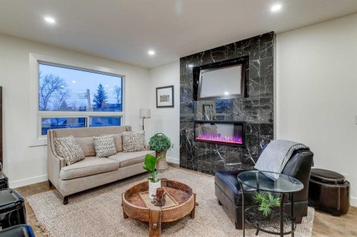 2126 18A Street Sw, Calgary, AB - Indoor Photo Showing Living Room With Fireplace