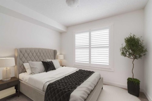 131 Cranford Walk Se, Calgary, AB - Indoor Photo Showing Bedroom