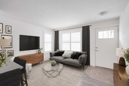 131 Cranford Walk Se, Calgary, AB - Indoor Photo Showing Living Room