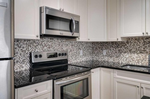 131 Cranford Walk Se, Calgary, AB - Indoor Photo Showing Kitchen With Stainless Steel Kitchen With Upgraded Kitchen