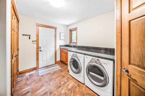 282 Miskow Close, Canmore, AB - Indoor Photo Showing Laundry Room