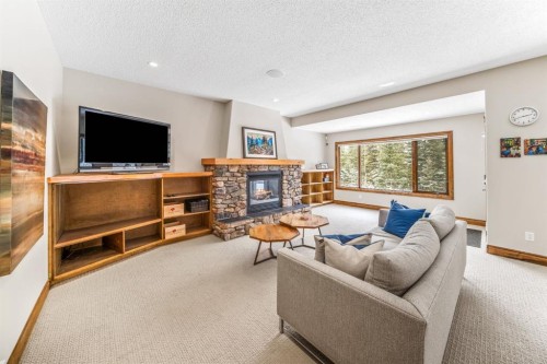282 Miskow Close, Canmore, AB - Indoor Photo Showing Living Room With Fireplace