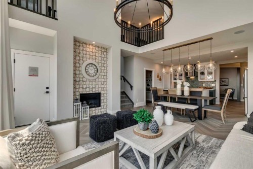 182 Setonstone Green Se, Calgary, AB - Indoor Photo Showing Living Room With Fireplace