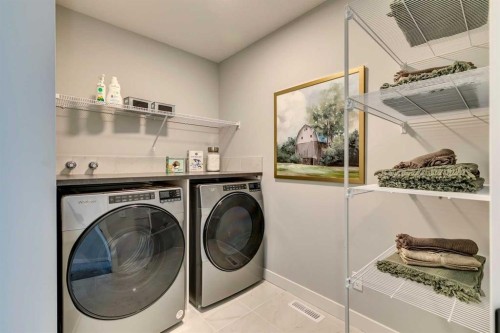 182 Setonstone Green Se, Calgary, AB - Indoor Photo Showing Laundry Room