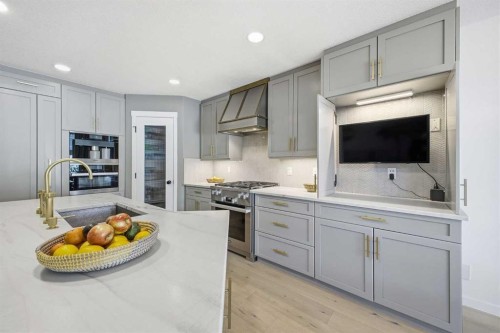 153 Cougarstone Common Sw, Calgary, AB - Indoor Photo Showing Kitchen With Upgraded Kitchen