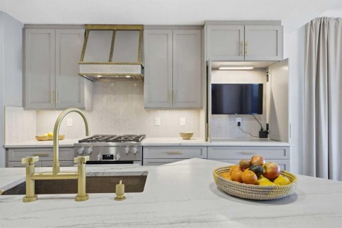 153 Cougarstone Common Sw, Calgary, AB - Indoor Photo Showing Kitchen With Upgraded Kitchen