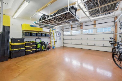 153 Cougarstone Common Sw, Calgary, AB - Indoor Photo Showing Garage