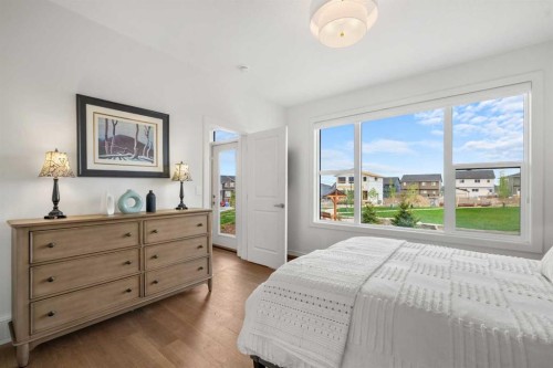 218 Mitchell Heath Nw, Calgary, AB - Indoor Photo Showing Bedroom