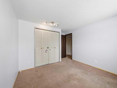 125-330 Canterbury Drive Sw, Calgary, AB - Indoor Photo Showing Other Room