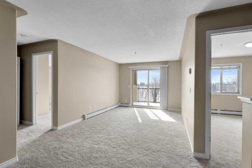 1327-8 Bridlecrest Drive Sw, Calgary, AB - Indoor Photo Showing Other Room