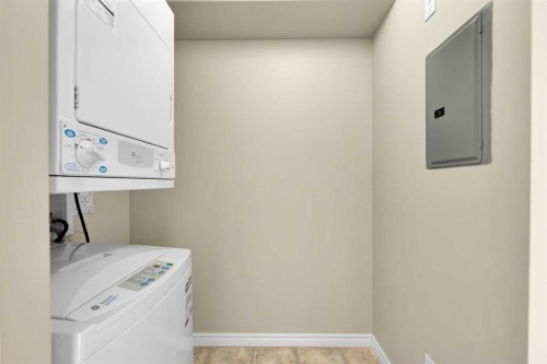 1327-8 Bridlecrest Drive Sw, Calgary, AB - Indoor Photo Showing Laundry Room