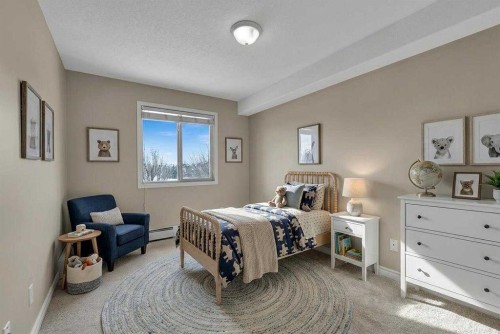 1327-8 Bridlecrest Drive Sw, Calgary, AB - Indoor Photo Showing Bedroom