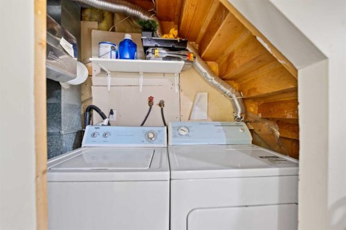 101 Taravista Crescent, Calgary, AB - Indoor Photo Showing Laundry Room