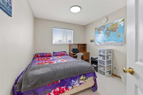 101 Taravista Crescent, Calgary, AB - Indoor Photo Showing Bedroom