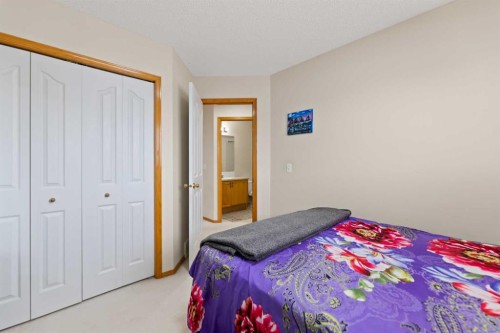 101 Taravista Crescent, Calgary, AB - Indoor Photo Showing Bedroom