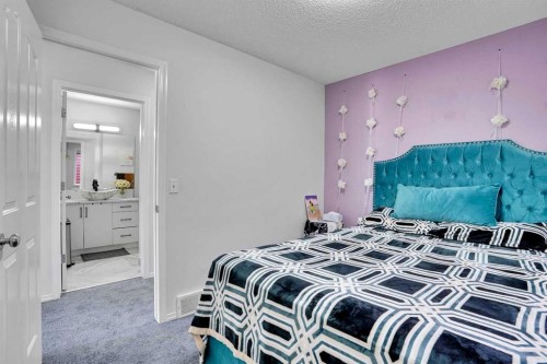 141 Saddlecrest Close Ne, Calgary, AB - Indoor Photo Showing Bedroom