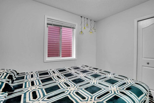 141 Saddlecrest Close Ne, Calgary, AB - Indoor Photo Showing Bedroom