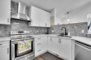 141 Saddlecrest Close Ne, Calgary, AB  - Indoor Photo Showing Kitchen With Upgraded Kitchen 