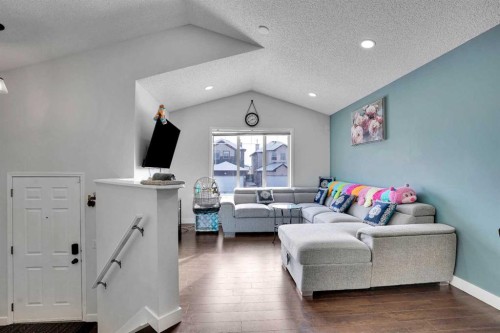 141 Saddlecrest Close Ne, Calgary, AB - Indoor Photo Showing Living Room