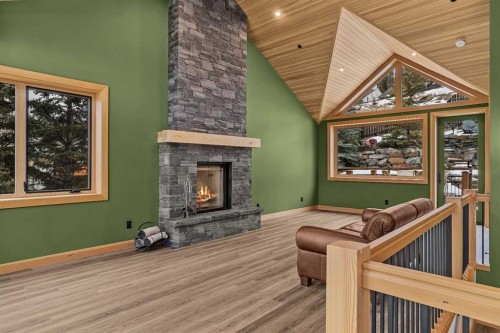 104 Rummel Place, Canmore, AB - Indoor Photo Showing Other Room With Fireplace