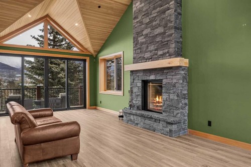 104 Rummel Place, Canmore, AB - Indoor Photo Showing Living Room With Fireplace