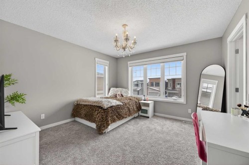 24 Walden Mount Se, Calgary, AB - Indoor Photo Showing Bedroom