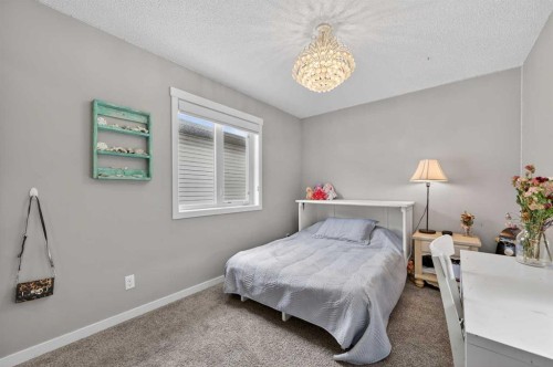 24 Walden Mount Se, Calgary, AB - Indoor Photo Showing Bedroom