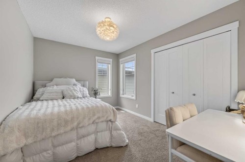 24 Walden Mount Se, Calgary, AB - Indoor Photo Showing Bedroom