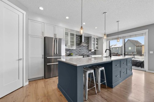 24 Walden Mount Se, Calgary, AB - Indoor Photo Showing Kitchen With Stainless Steel Kitchen With Upgraded Kitchen