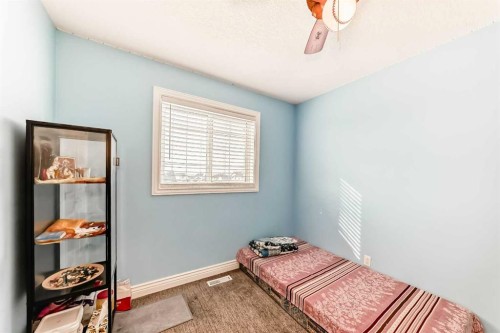 181 Saddlefield Place Ne, Calgary, AB - Indoor Photo Showing Bedroom