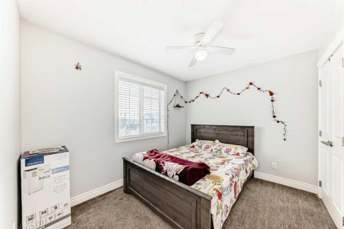 181 Saddlefield Place Ne, Calgary, AB - Indoor Photo Showing Bedroom