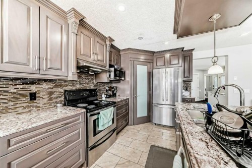 181 Saddlefield Place Ne, Calgary, AB - Indoor Photo Showing Kitchen With Stainless Steel Kitchen With Upgraded Kitchen