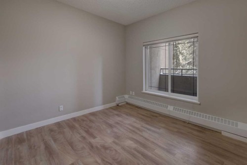 209-10 Discovery Ridge Close Sw, Calgary, AB - Indoor Photo Showing Other Room