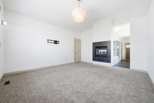 428 Aspen Glen Place Sw, Calgary, AB - Indoor With Fireplace