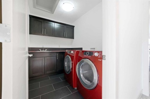 428 Aspen Glen Place Sw, Calgary, AB - Indoor Photo Showing Laundry Room