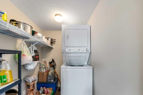 201-2300 Evanston Square Nw, Calgary, AB - Indoor Photo Showing Laundry Room