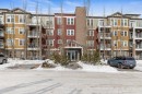 201-2300 Evanston Square Nw, Calgary, AB  - Outdoor With Balcony With Facade 