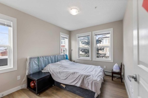 201-2300 Evanston Square Nw, Calgary, AB - Indoor Photo Showing Bedroom