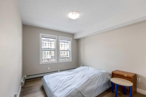 201-2300 Evanston Square Nw, Calgary, AB - Indoor Photo Showing Bedroom
