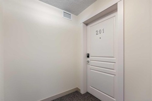 201-2300 Evanston Square Nw, Calgary, AB - Indoor Photo Showing Other Room