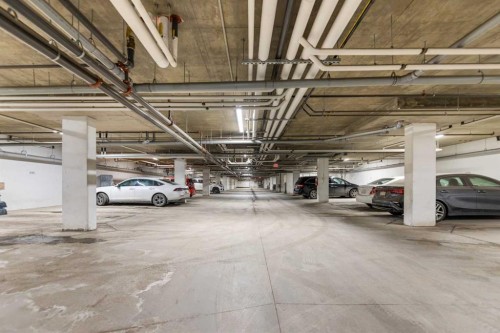 201-2300 Evanston Square Nw, Calgary, AB - Indoor Photo Showing Garage