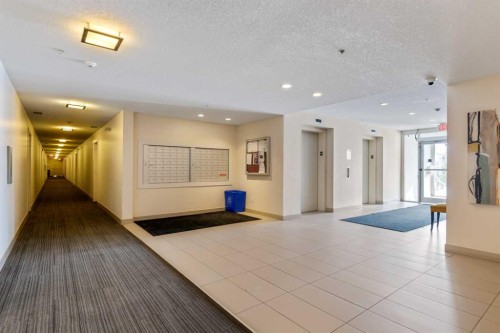 201-2300 Evanston Square Nw, Calgary, AB - Indoor Photo Showing Other Room