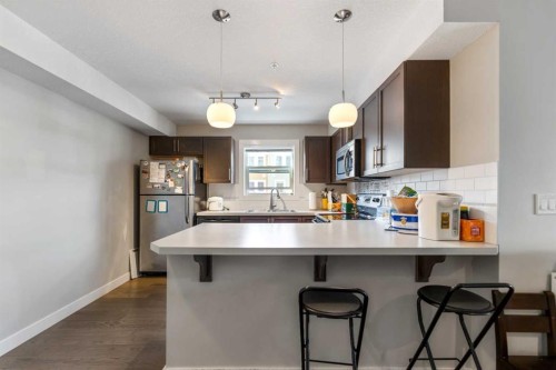 201-2300 Evanston Square Nw, Calgary, AB - Indoor Photo Showing Kitchen
