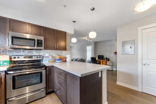 201-2300 Evanston Square Nw, Calgary, AB - Indoor Photo Showing Kitchen
