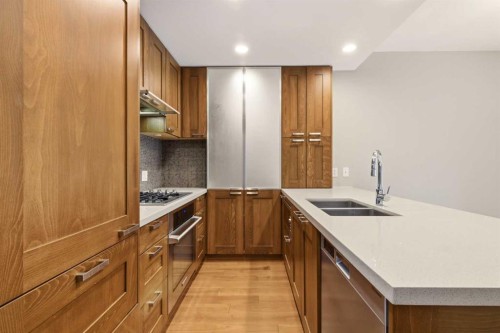 521-222 Riverfront Avenue Sw, Calgary, AB - Indoor Photo Showing Kitchen With Double Sink