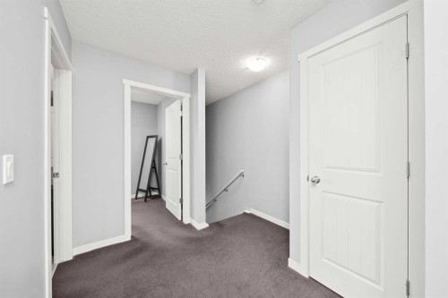 15 Copperpond Landing Se, Calgary, AB - Indoor Photo Showing Other Room